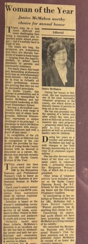Framed 1991 newspaper clipping titled Woman of the Year about Janice McMahon, with her photograph